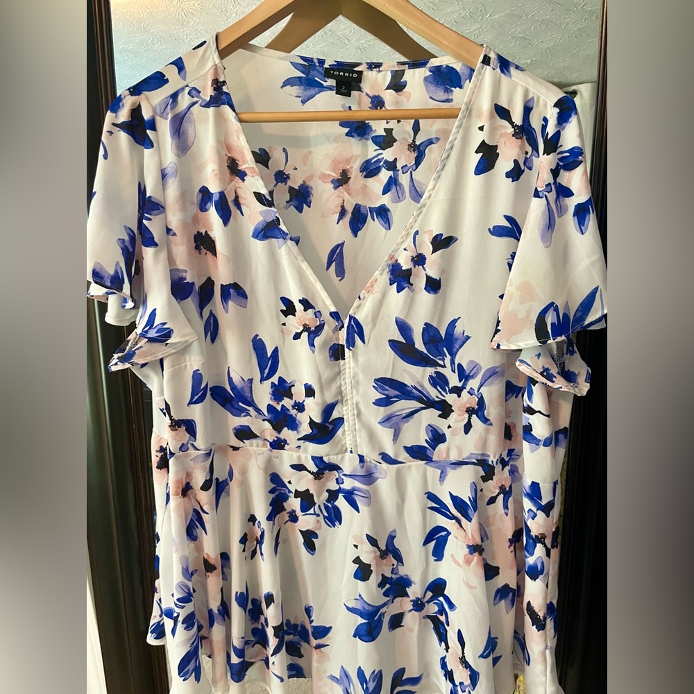 Torrid, size 2, floral peplum blouse.